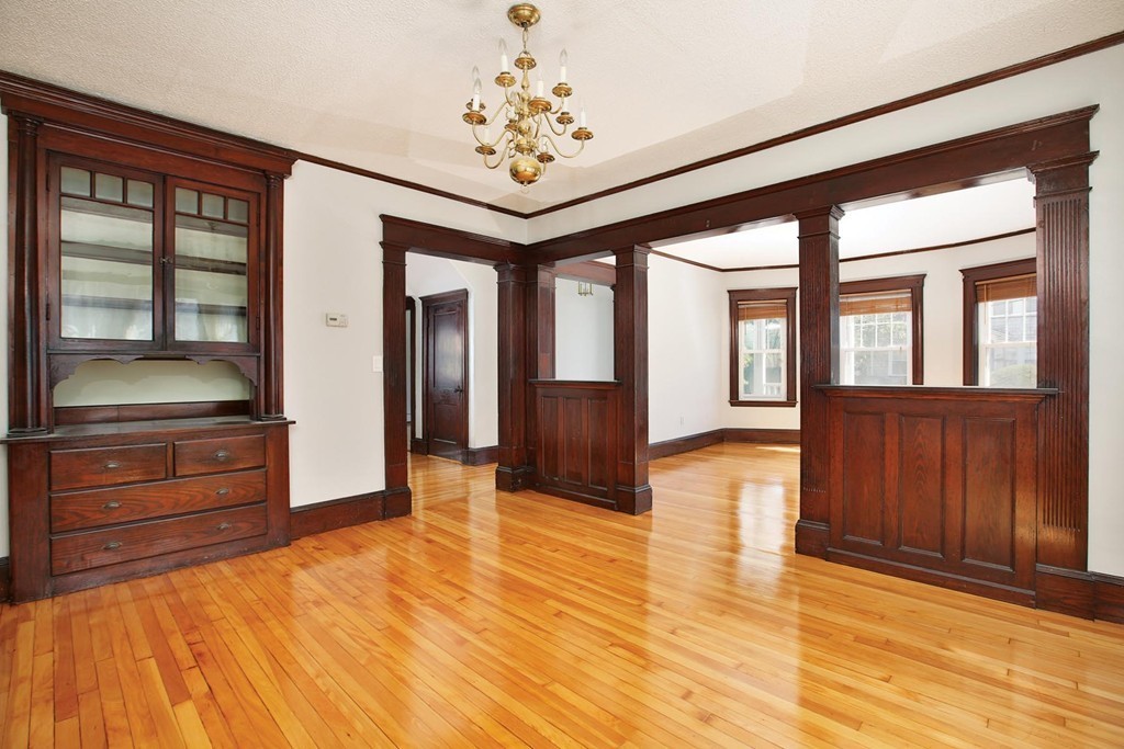 14-16 Presentation Road Boston, MA 02135 - Photo 6 of 12 a view of an entryway with wooden floor and door