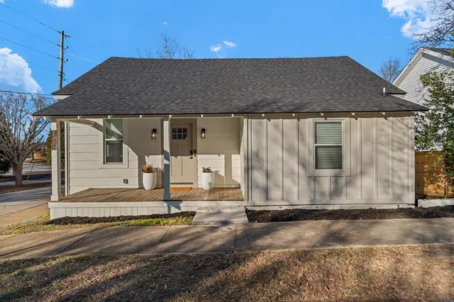 a front view of house with street