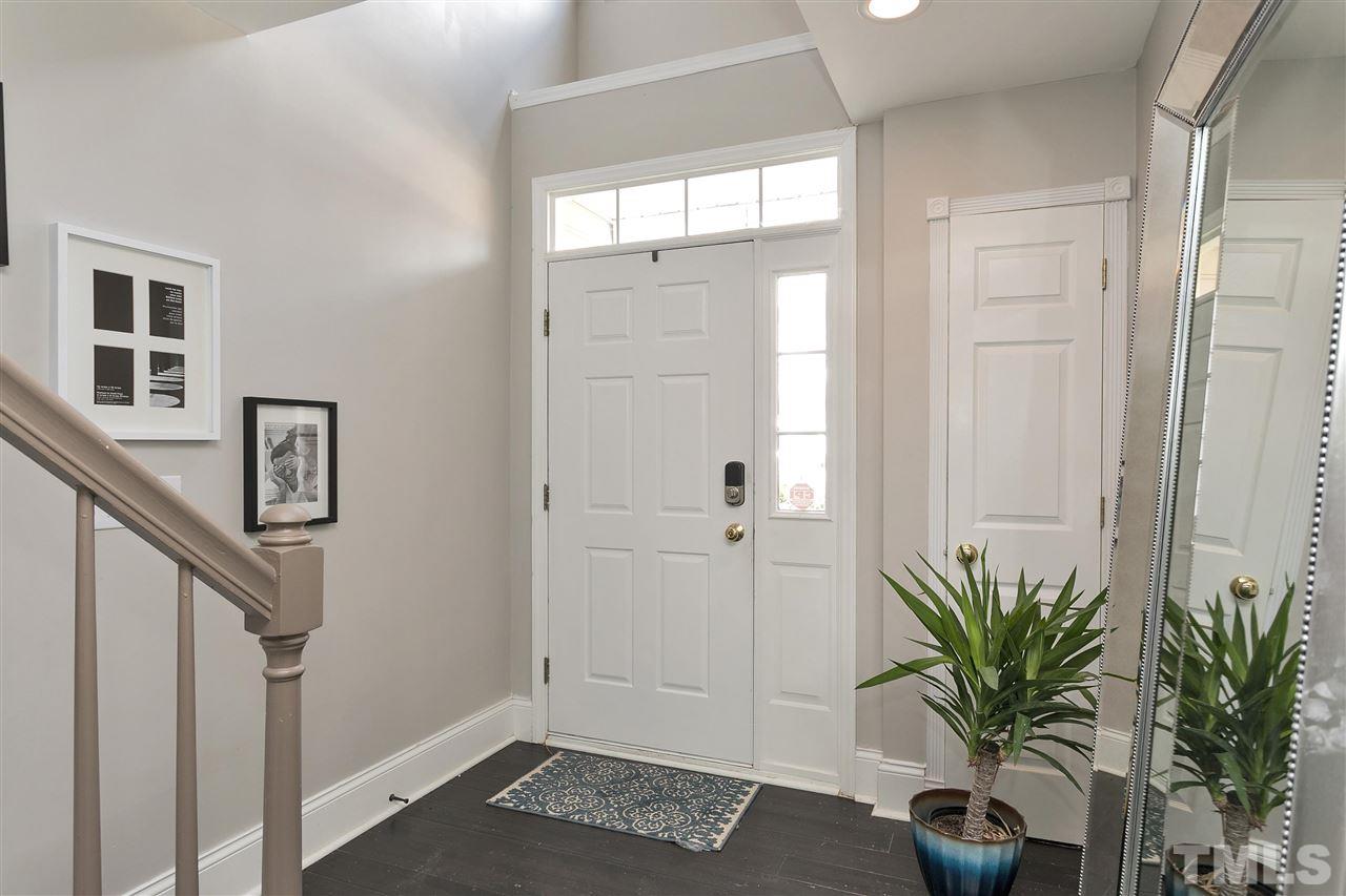 7206 Doverton Court Raleigh, NC 27615 - Photo 22 of 23 a view of entryway with wooden floor