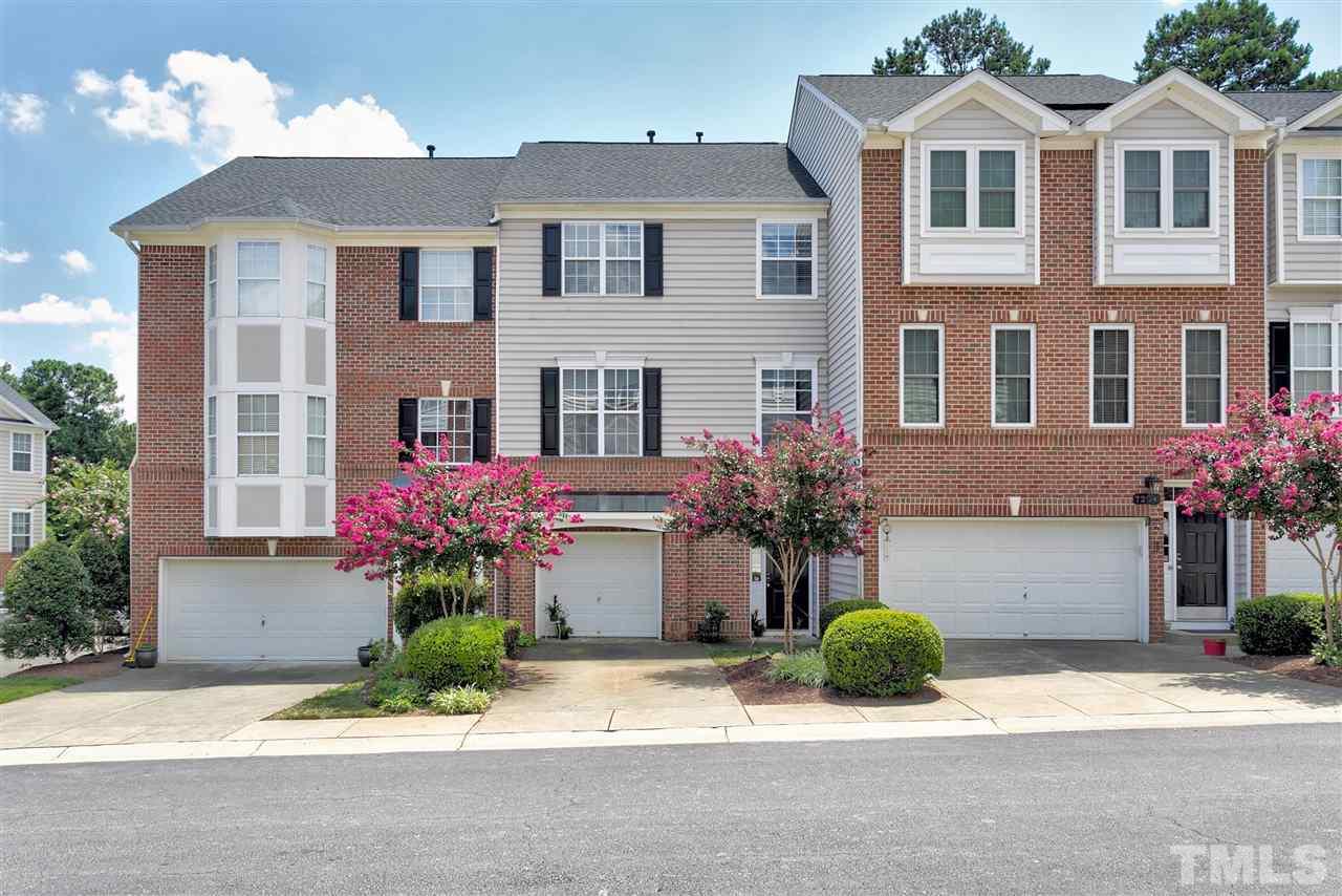 7206 Doverton Court Raleigh, NC 27615 - Photo 23 of 23 a front view of a house with yard