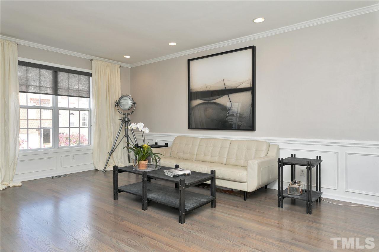 7206 Doverton Court Raleigh, NC 27615 - Photo 5 of 23 a living room with furniture and a window