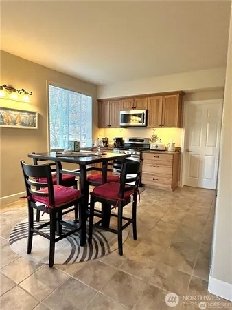 a view of a dining room with furniture