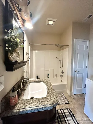 a kitchen with a sink stove and refrigerator