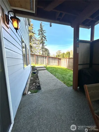 a view of swimming pool with seating area
