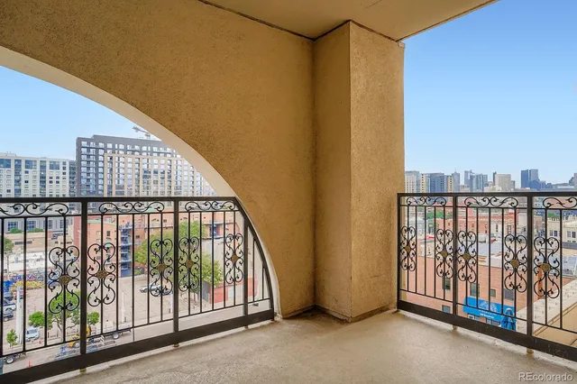 a view of a hallway with windows