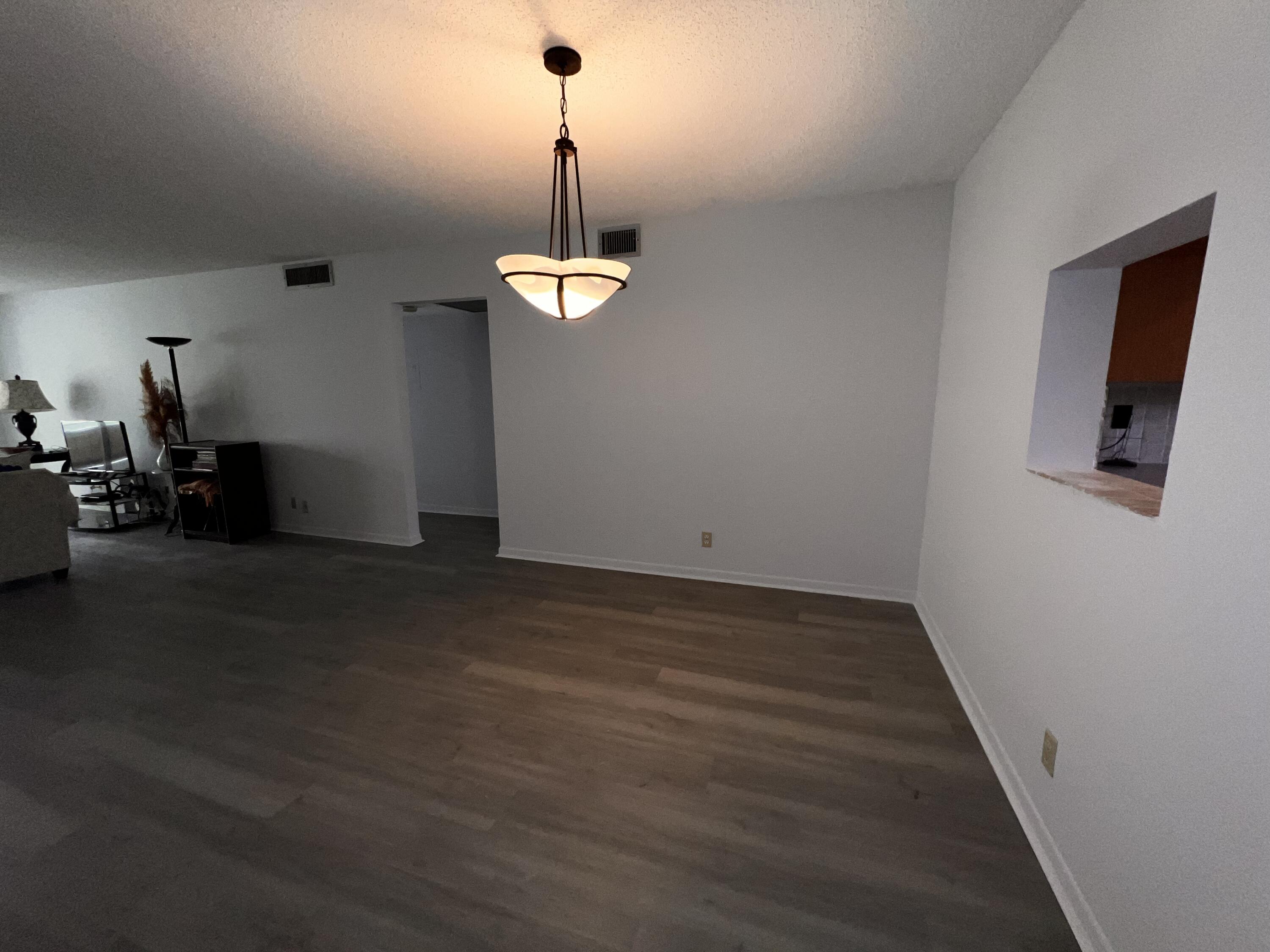 2403 Antigua Circle, Unit O2 Coconut Creek, FL 33066 - Photo 27 of 31 a view of empty room with a fireplace