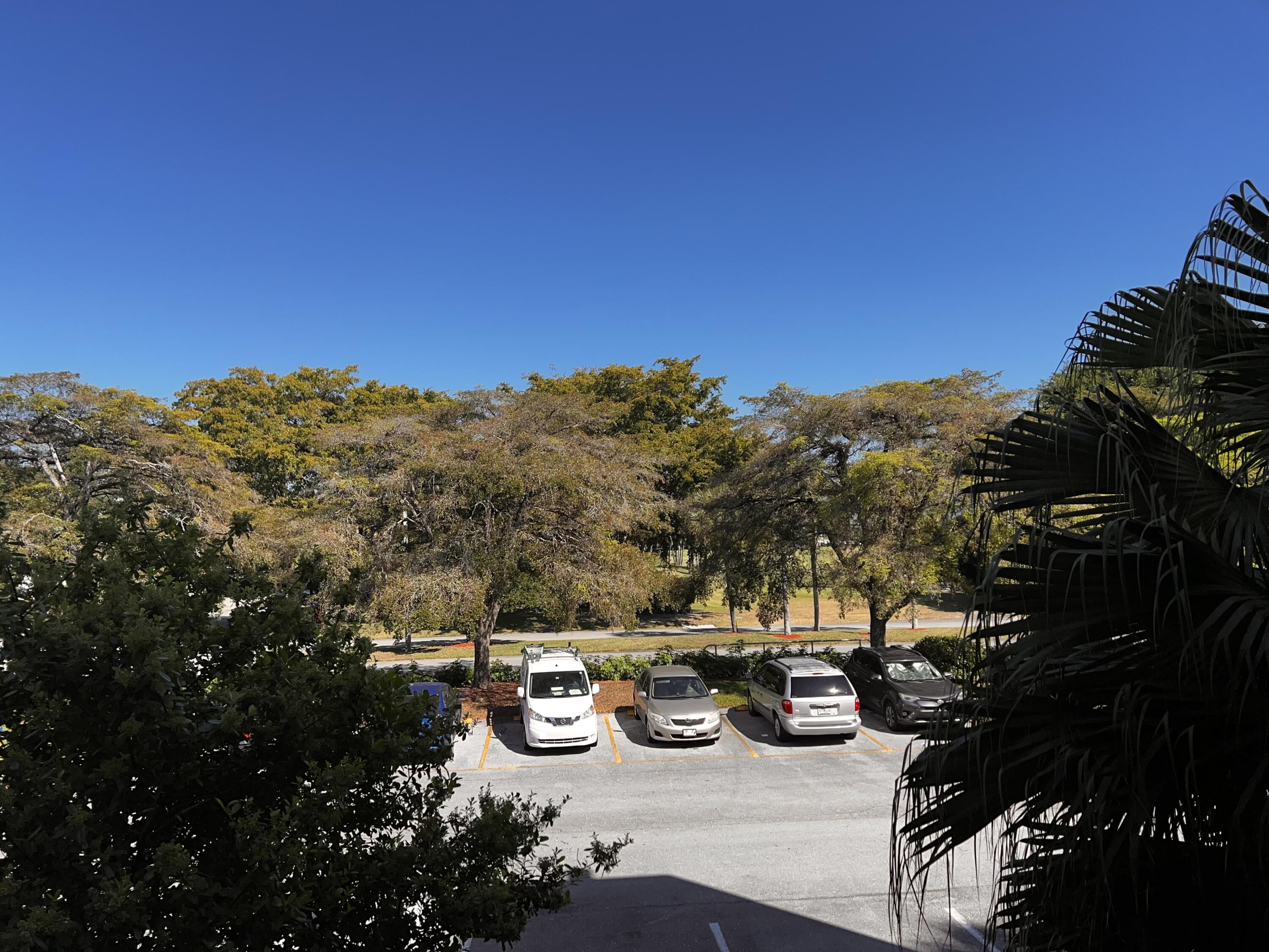 2403 Antigua Circle, Unit O2 Coconut Creek, FL 33066 - Photo 29 of 31 a view of a ocean with mountain view