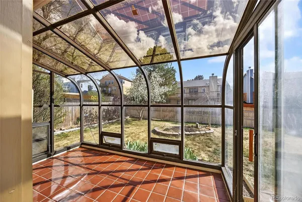 a view of a room with large windows