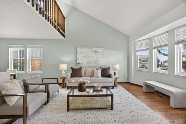 a living room with furniture or couch and a window