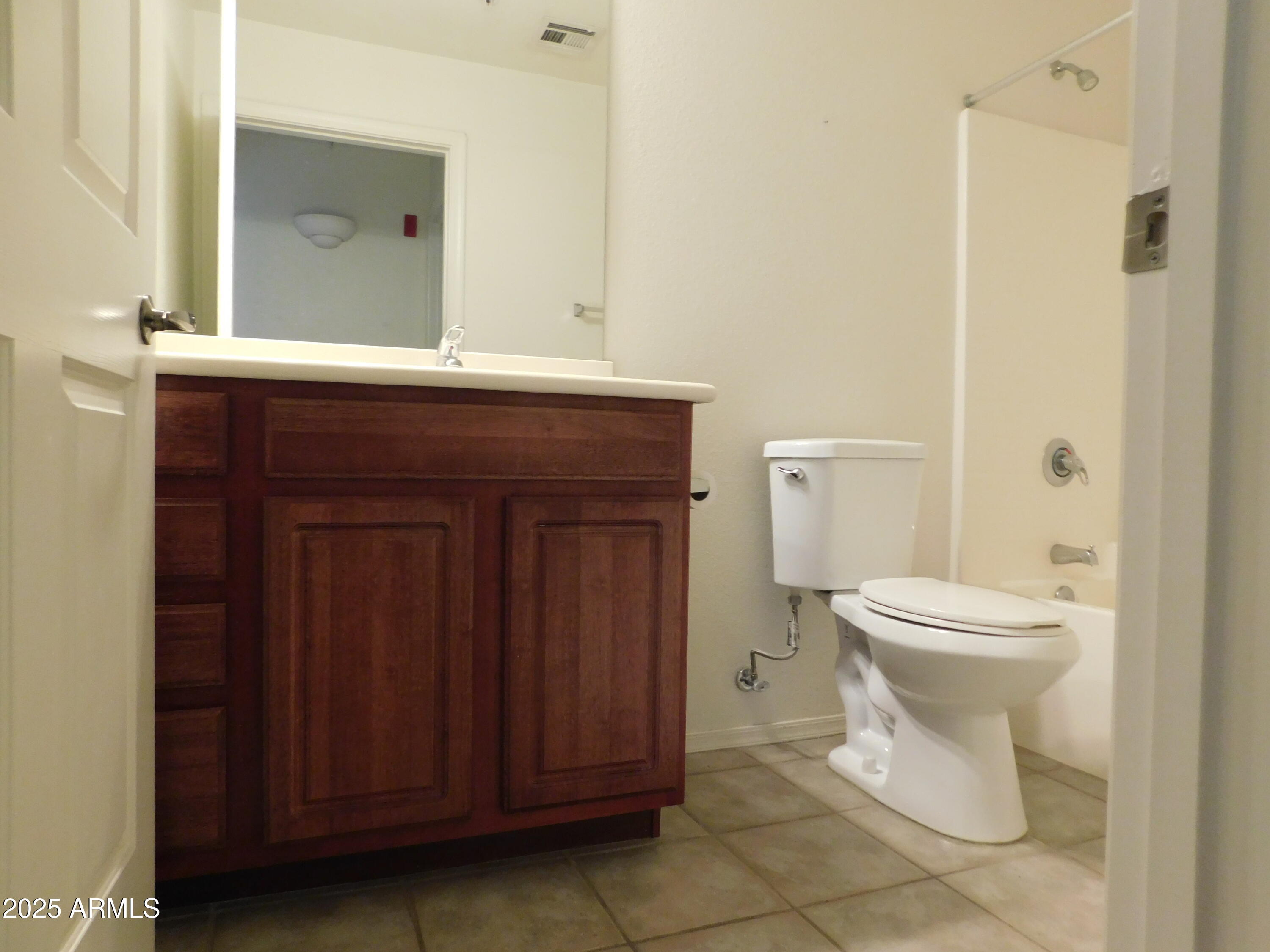 920 East Devonshire Avenue, Unit 4020 Phoenix, AZ 85014 - Photo 8 of 12 a bathroom with a toilet and a sink