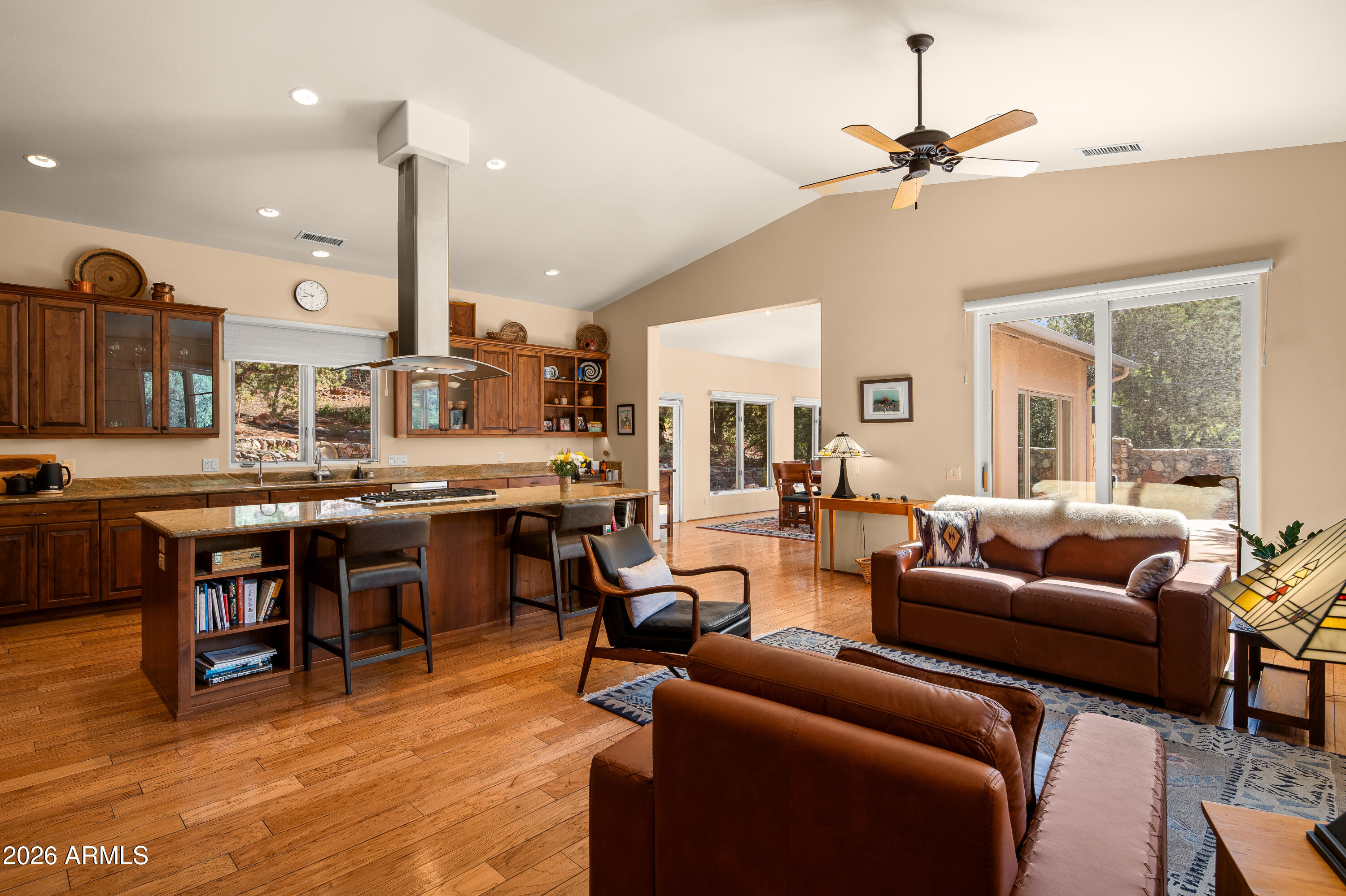 190 Morgan Road Sedona, AZ 86336 - Photo 23 of 51 a living room with furniture kitchen view and a large window