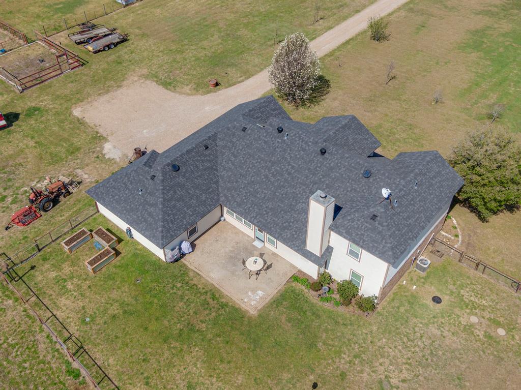 130 Eubanks Road Maypearl, TX 76064 - Photo 32 of 39 an aerial view of houses with outdoor space