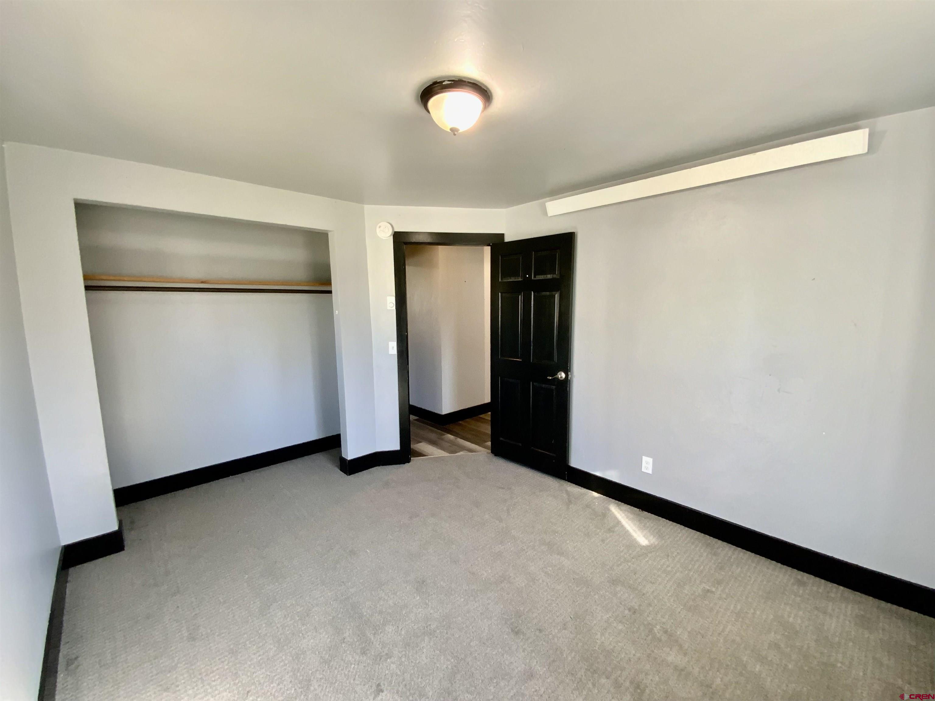 1511 West Tomichi Avenue Gunnison, CO 81230 - Photo 18 of 20 an empty room with closet and entertaining space