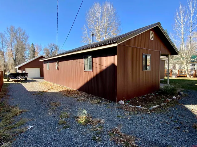 a view of backyard of house