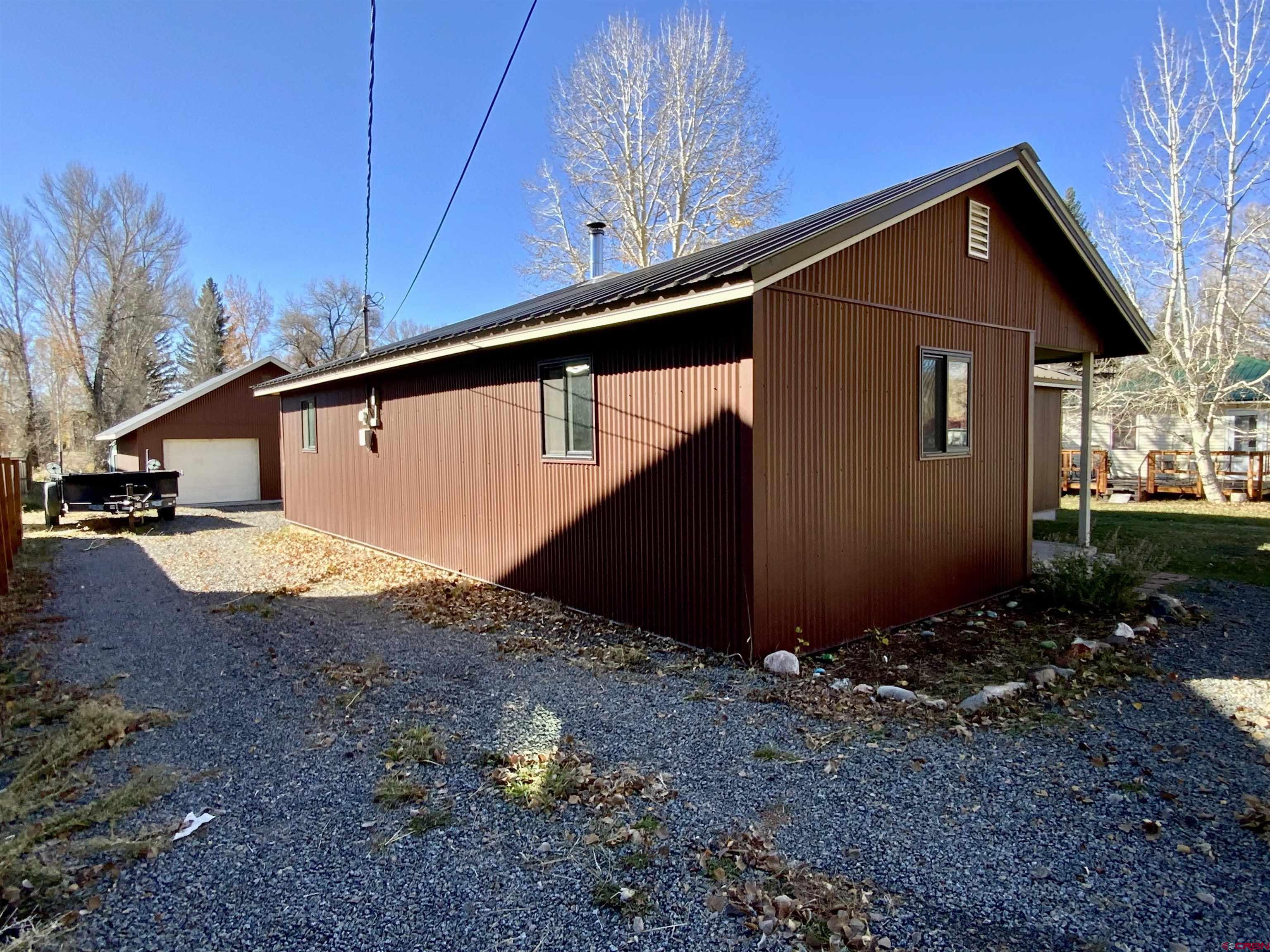 1511 West Tomichi Avenue Gunnison, CO 81230 - Photo 4 of 20 a view of backyard of house