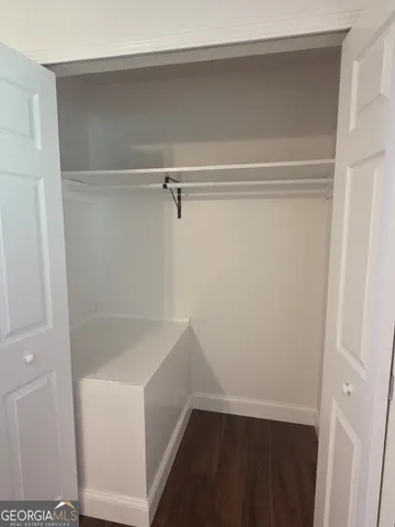 a view of small space with racks on the wall