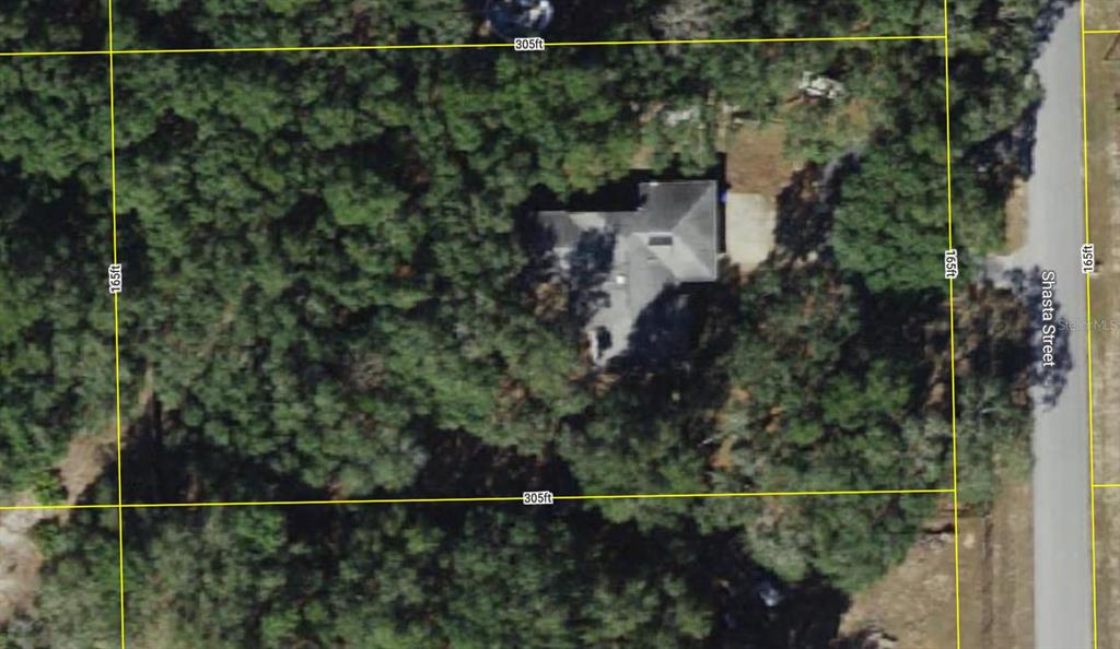 9121 Shasta Street Webster, FL 33597 - Photo 3 of 3 a view of a city from a balcony