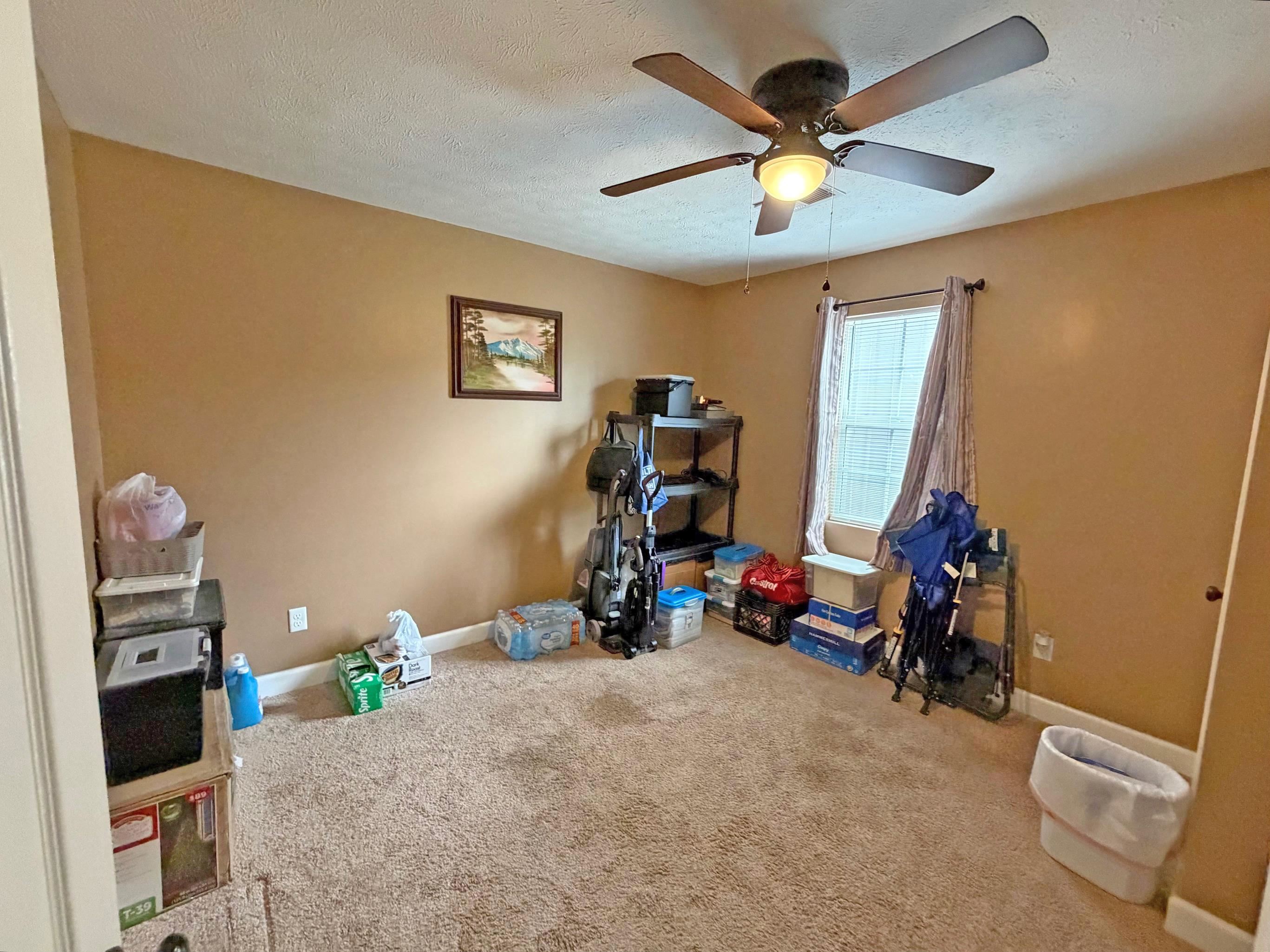 1255 Elm Road Adamsville, TN 38310 - Photo 20 of 32 a view of a room with gym equipment