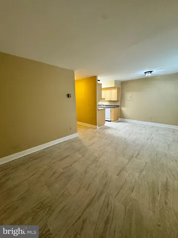 a view of a big room with wooden floor