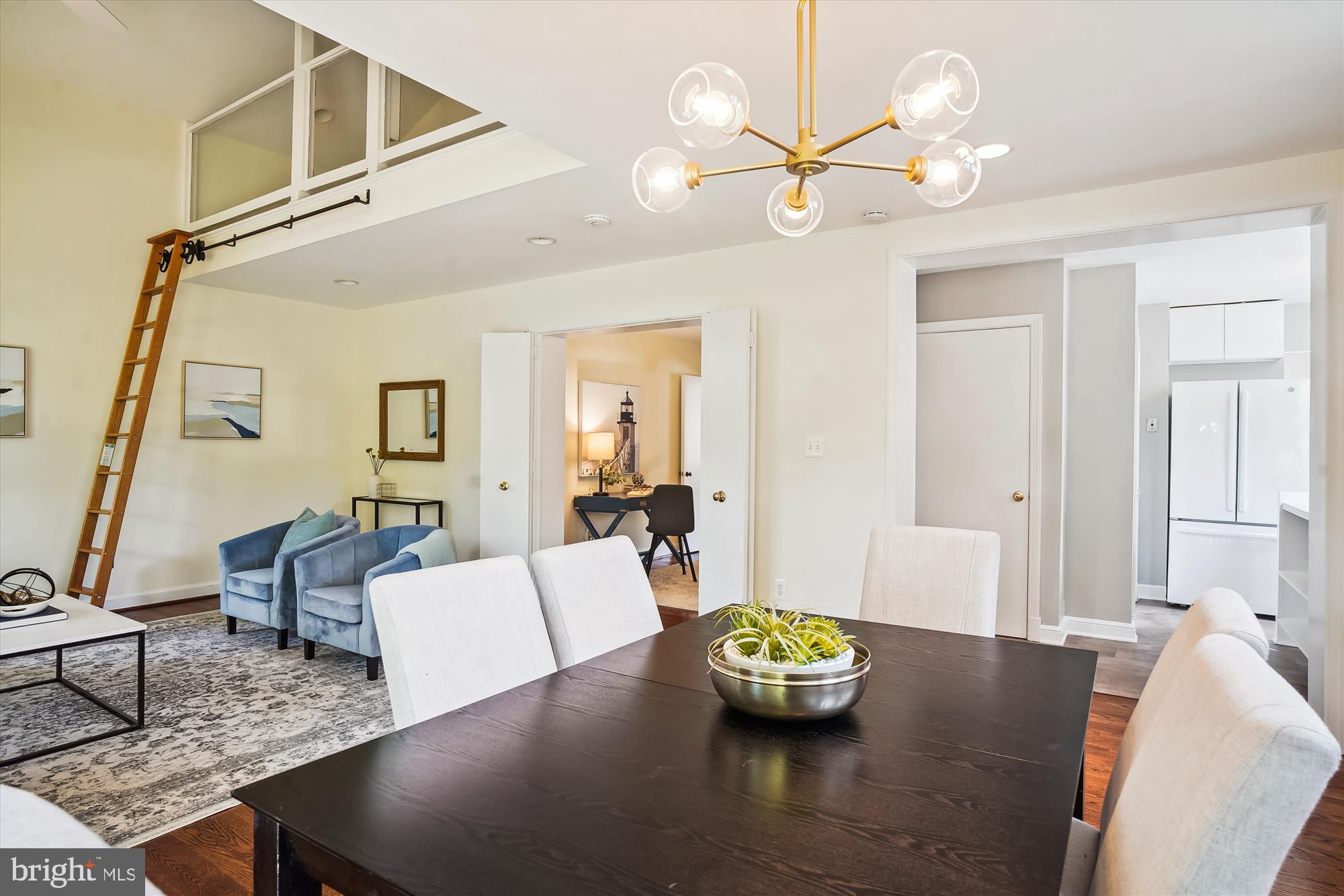 10106 Portland Place Silver Spring, MD 20901 - Photo 13 of 38 a living room with furniture and a chandelier