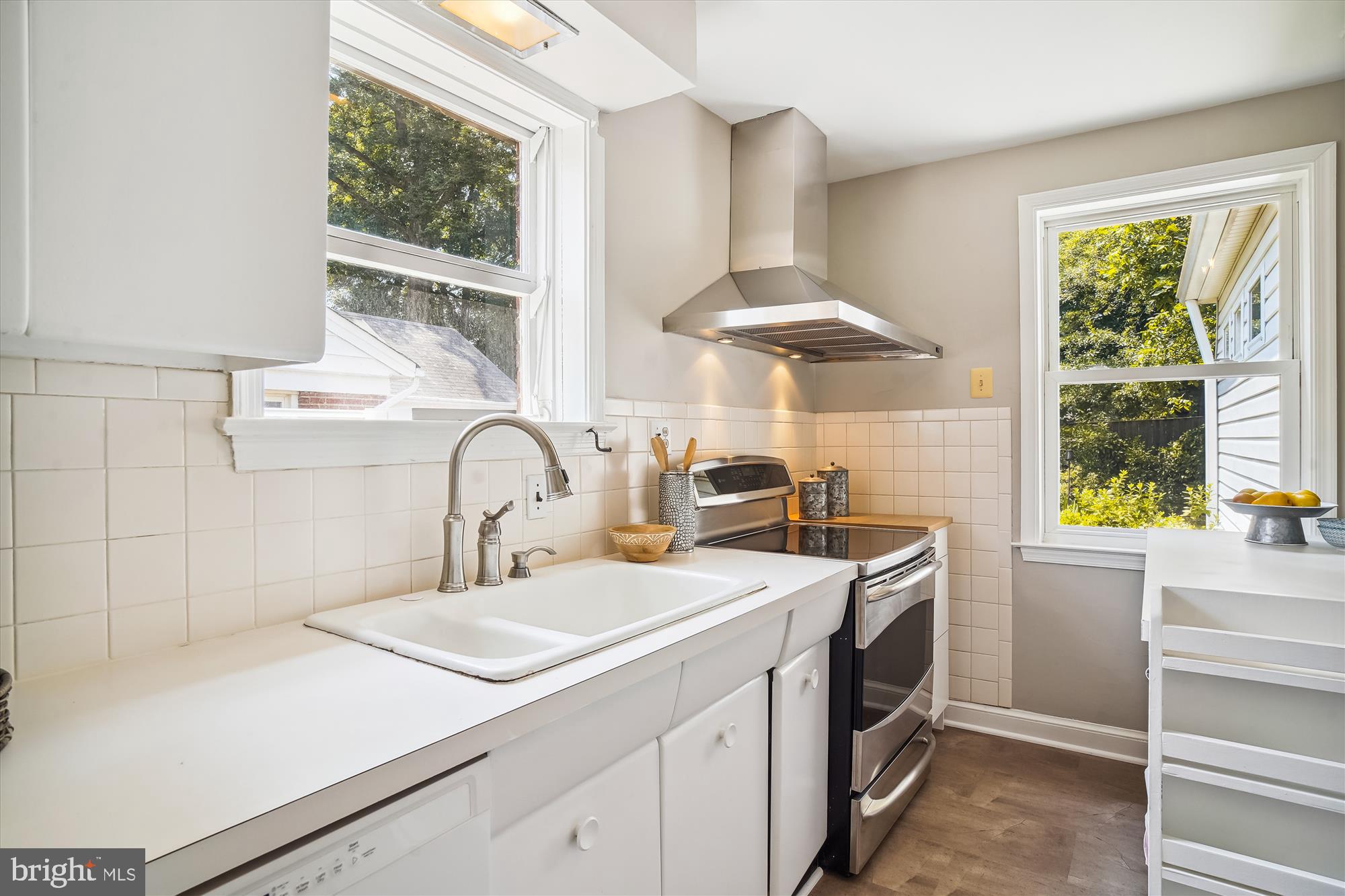 10106 Portland Place Silver Spring, MD 20901 - Photo 16 of 38 a kitchen with a sink and a window