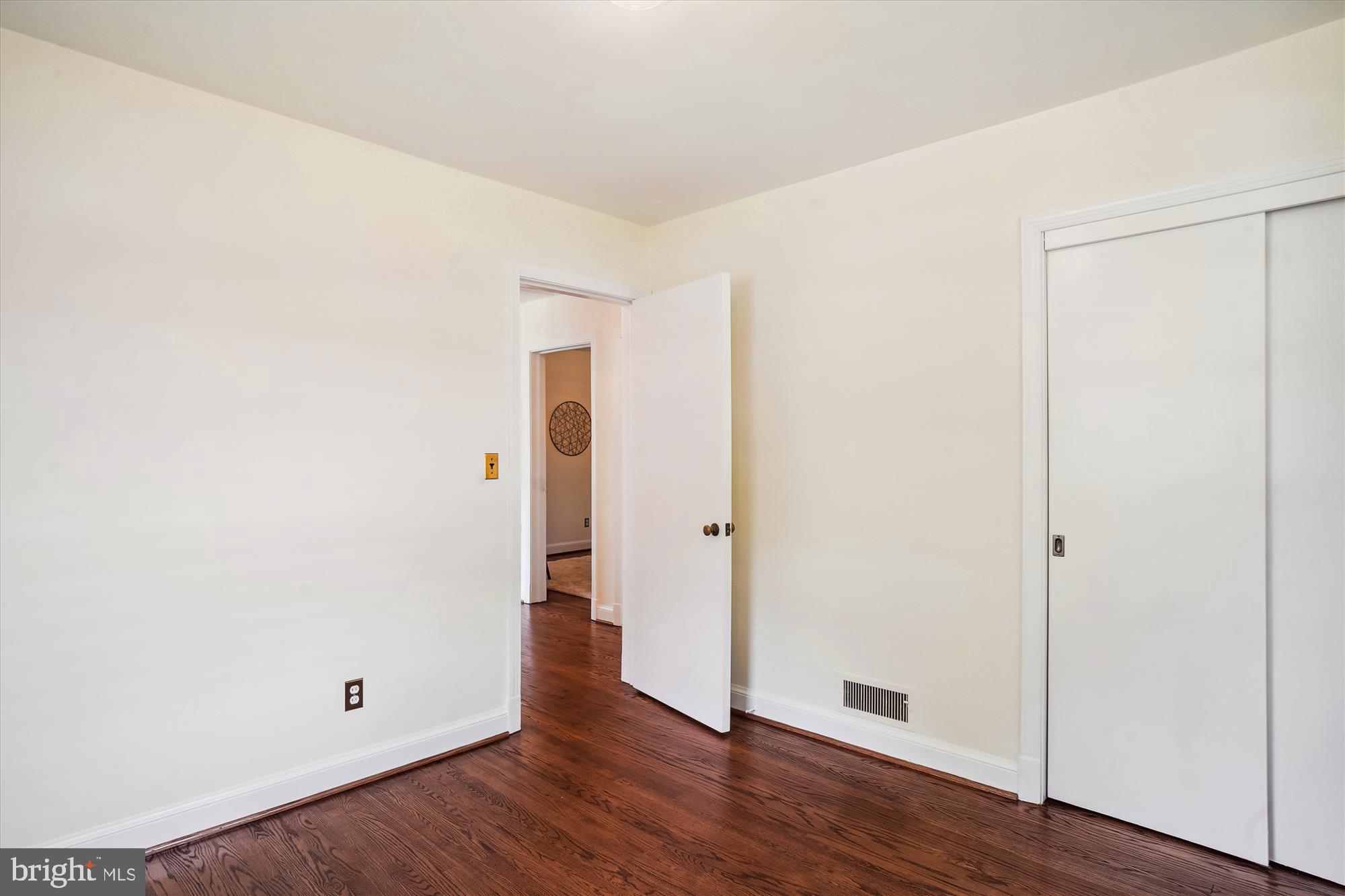 10106 Portland Place Silver Spring, MD 20901 - Photo 24 of 38 a view of a room with wooden floor