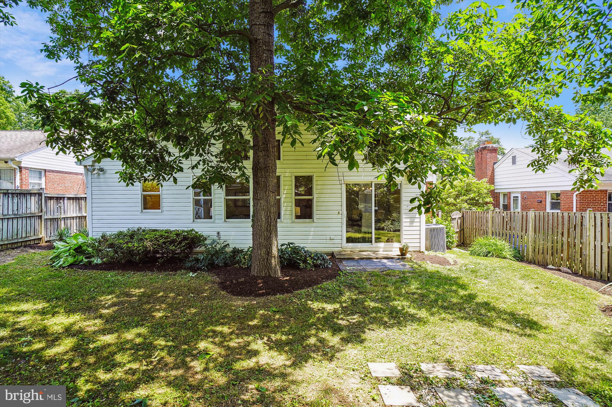 10106 Portland Place Silver Spring, MD 20901 - Photo 34 of 38 a front view of a house with garden