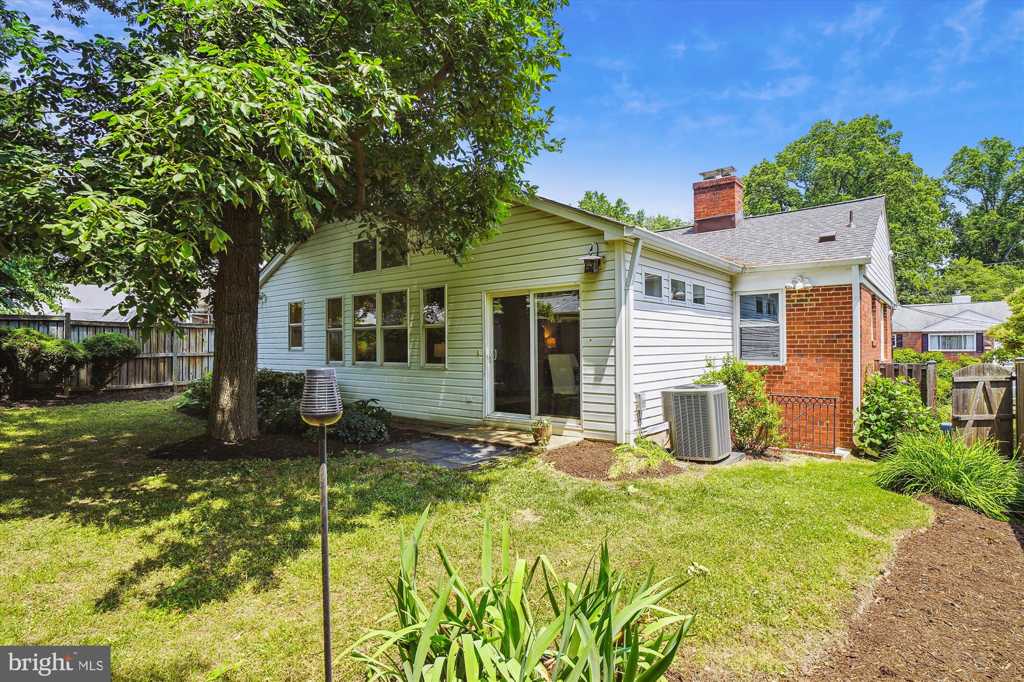 10106 Portland Place Silver Spring, MD 20901 - Photo 36 of 38 front view of a house with a yard