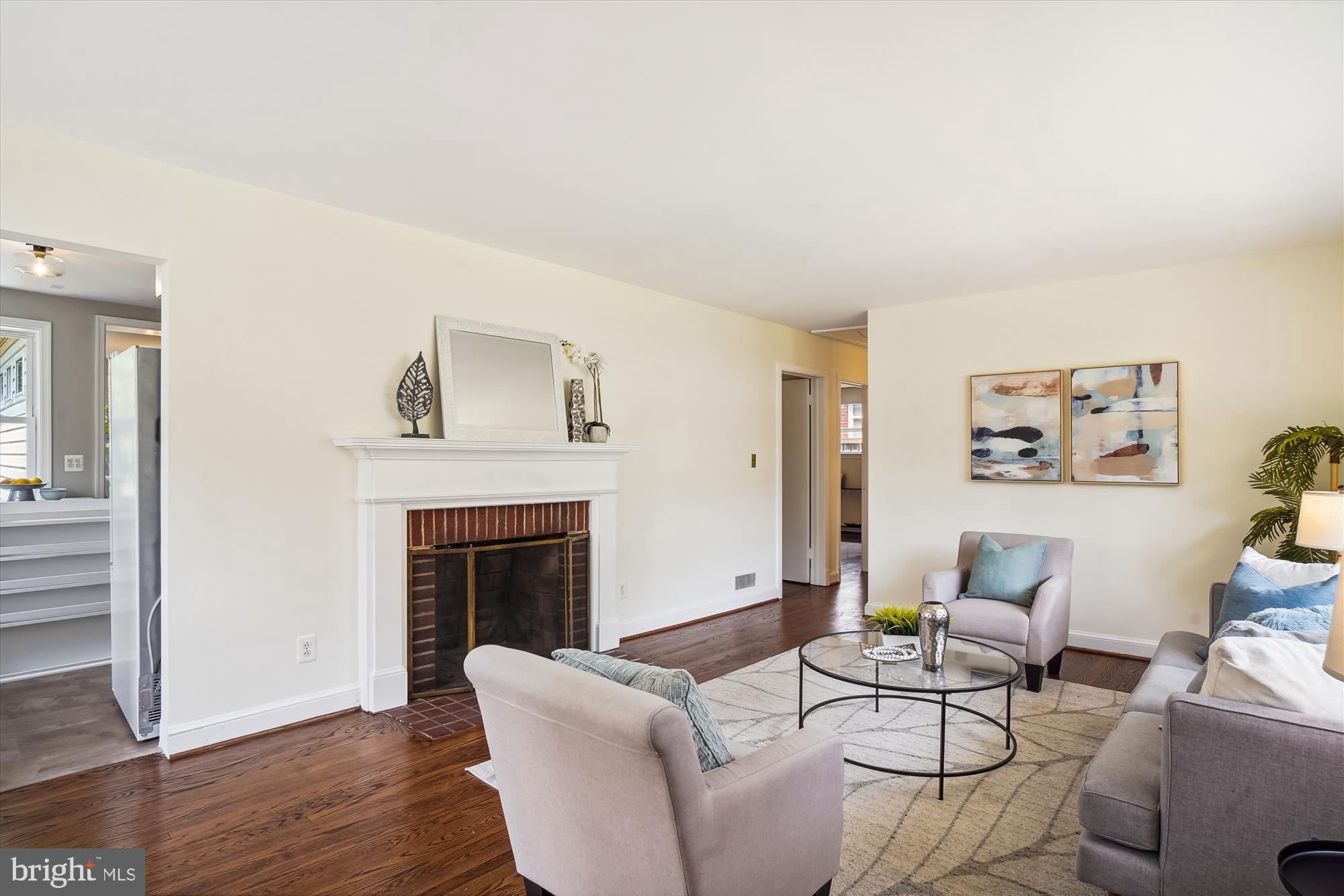 10106 Portland Place Silver Spring, MD 20901 - Photo 6 of 38 a living room with furniture and a fireplace