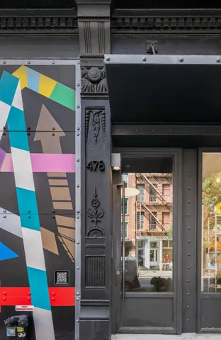 a front view of a house with a garage