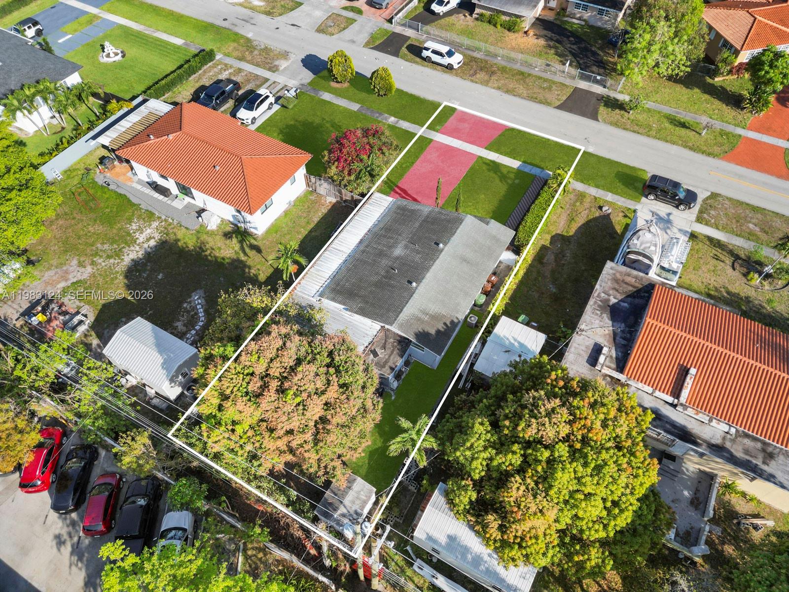 120 West 50th Street Hialeah, FL 33012 - Photo 7 of 37 an aerial view of a residential houses with outdoor space