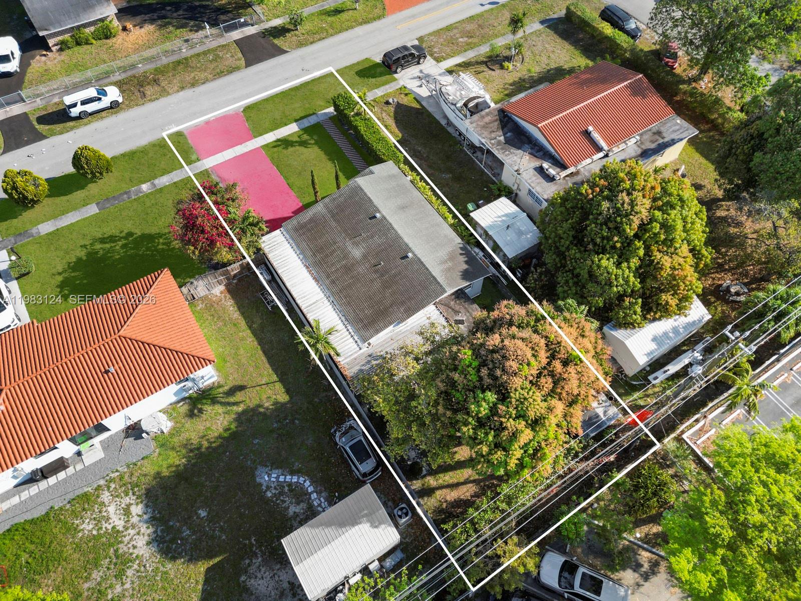 120 West 50th Street Hialeah, FL 33012 - Photo 8 of 37 an aerial view of a house
