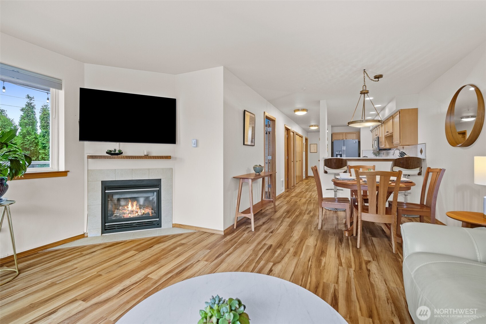 1011 Bancroft Street, Unit 204 Bellingham, WA 98225 - Photo 15 of 32 a view of a livingroom with furniture fireplace and wooden floor