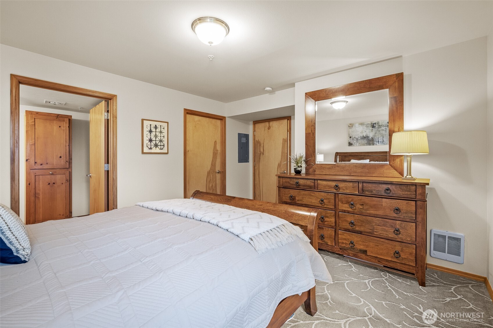 1011 Bancroft Street, Unit 204 Bellingham, WA 98225 - Photo 16 of 32 a bedroom with a bed and a dresser