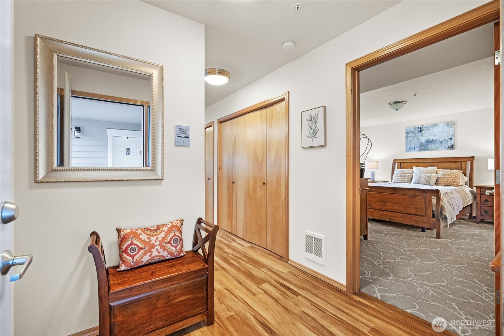 1011 Bancroft Street, Unit 204 Bellingham, WA 98225 - Photo 21 of 32 a bedroom with furniture and a wooden floor