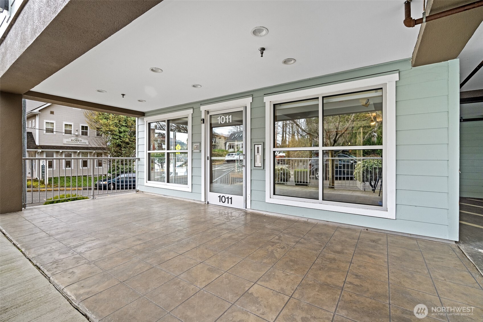 1011 Bancroft Street, Unit 204 Bellingham, WA 98225 - Photo 29 of 32 a view of an empty room with a balcony