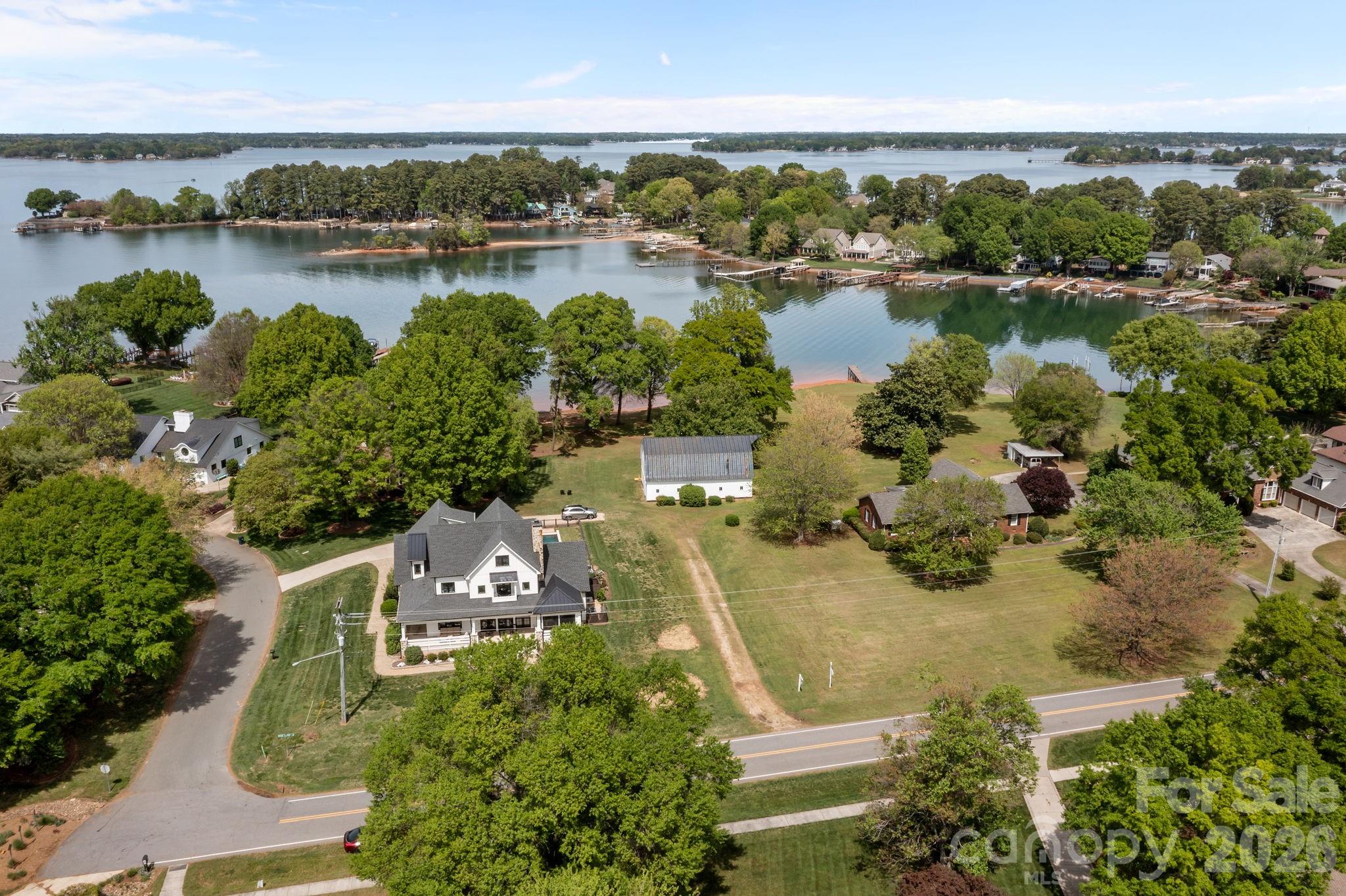 21422 Bethel Church Road Cornelius, NC 28031 - Photo 12 of 19 an aerial view of a house with a lake view