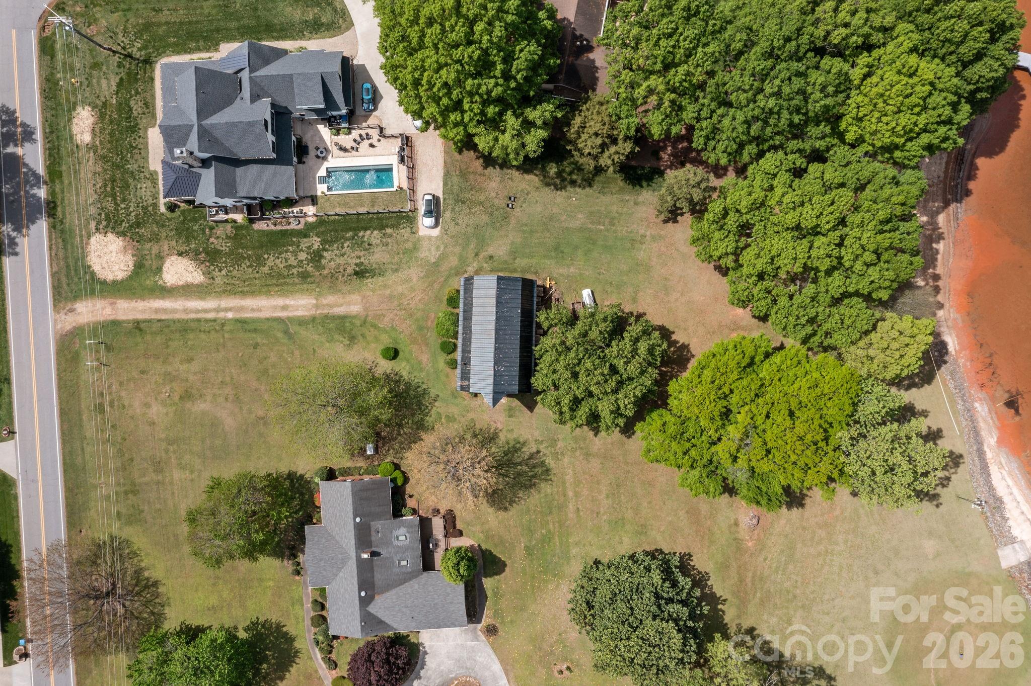 21422 Bethel Church Road Cornelius, NC 28031 - Photo 14 of 19 an aerial view of a house with a yard