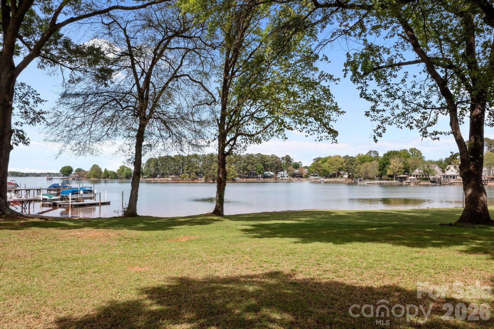 21422 Bethel Church Road Cornelius, NC 28031 - Photo 3 of 19 a view of a lake with houses