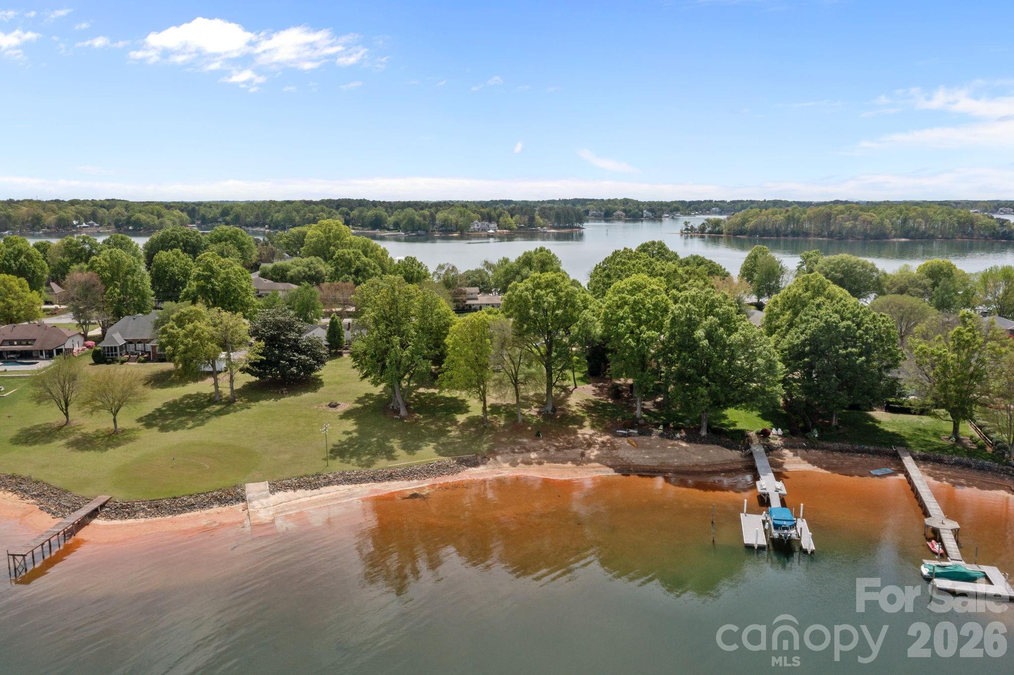 21422 Bethel Church Road Cornelius, NC 28031 - Photo 6 of 19 a view of a swimming pool with a yard