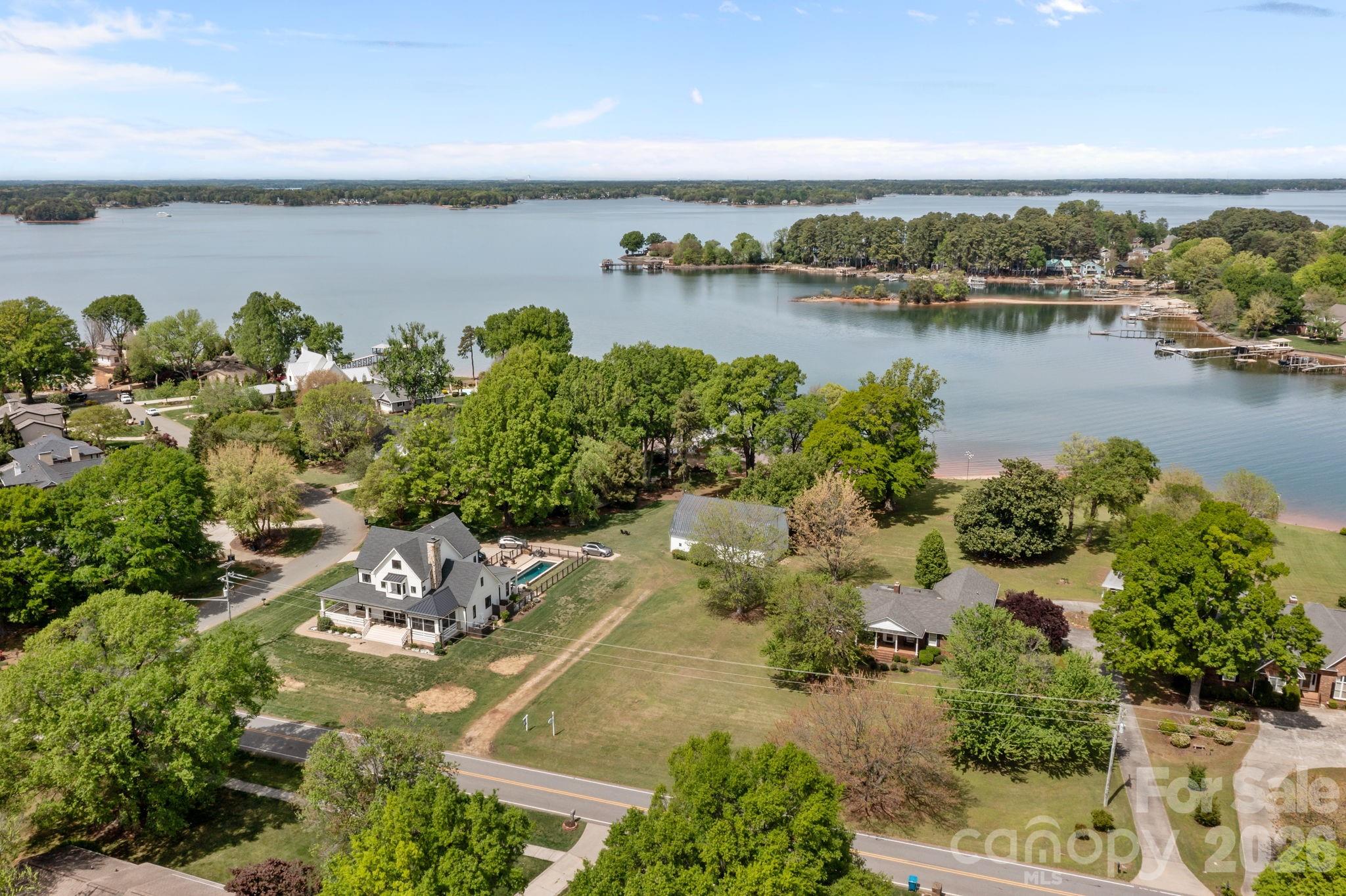 21422 Bethel Church Road Cornelius, NC 28031 - Photo 9 of 19 an aerial view of a houses with outdoor space and lake view