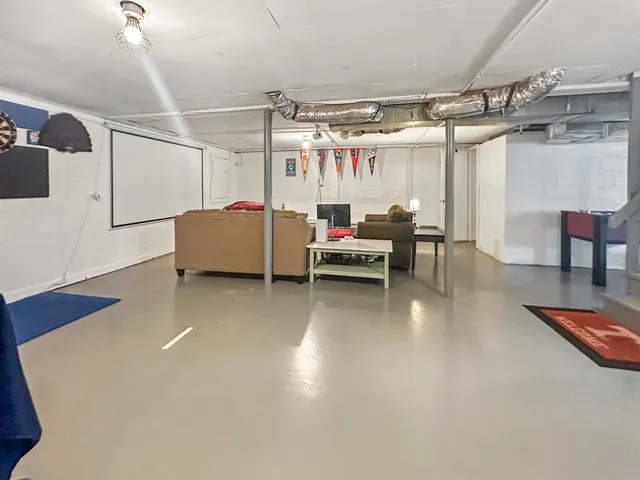 a living room with dining table