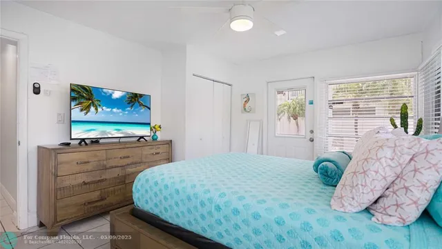 a view of an outside dining space with furniture