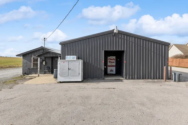 a front view of a house with garage