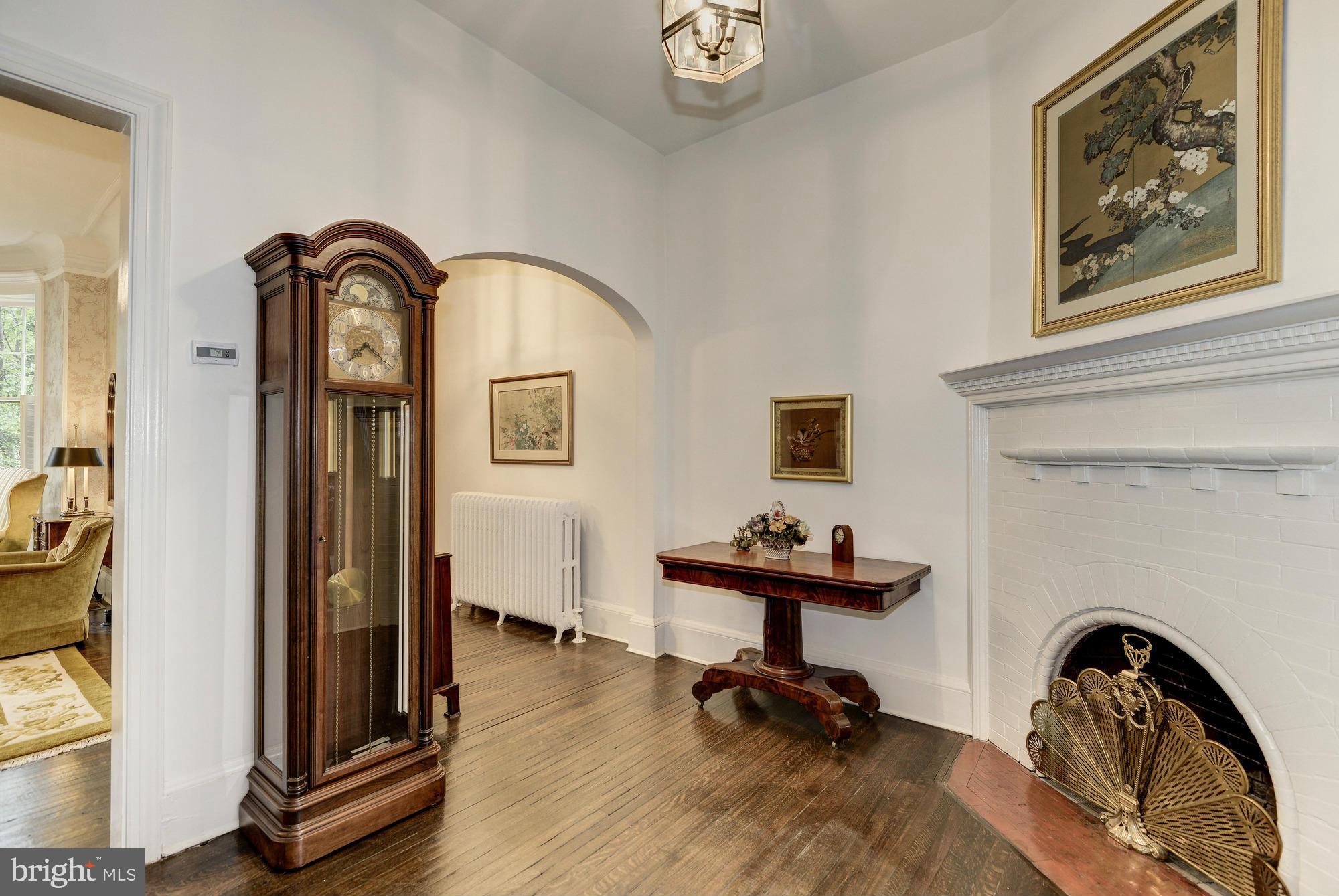 1616 S Street Northwest Washington, DC 20009 - Photo 5 of 30 a view of a workspace with furniture and a gym equipment