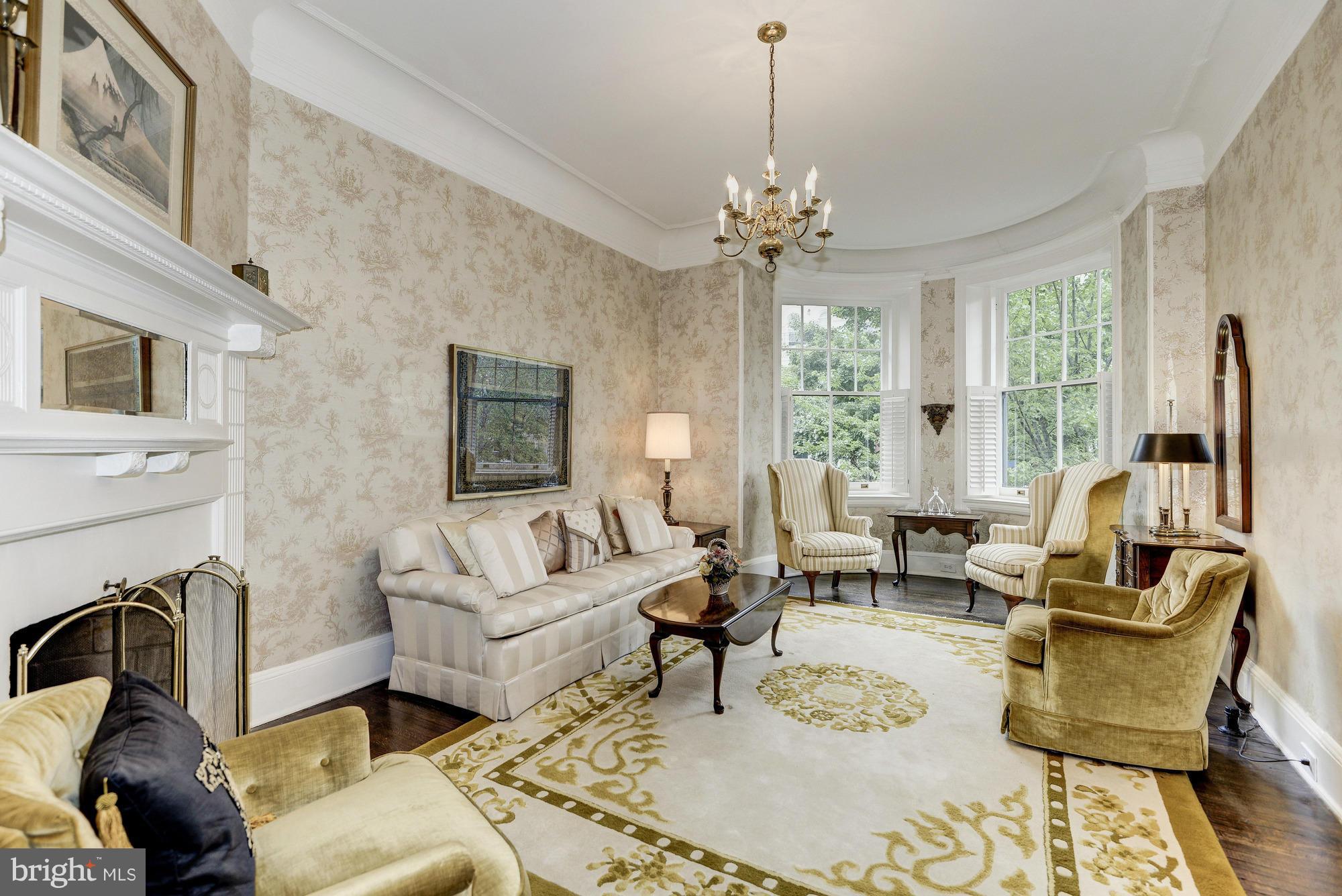 1616 S Street Northwest Washington, DC 20009 - Photo 6 of 30 a living room with furniture fireplace and a chandelier