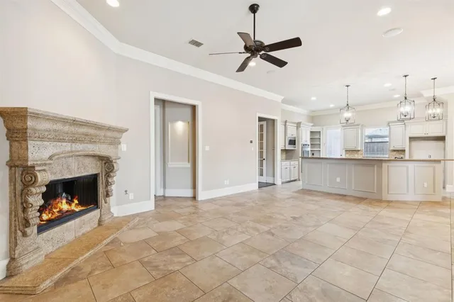 a view of a kitchen with furniture and a fireplace