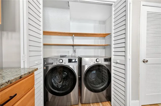 a utility room with dryer and washer