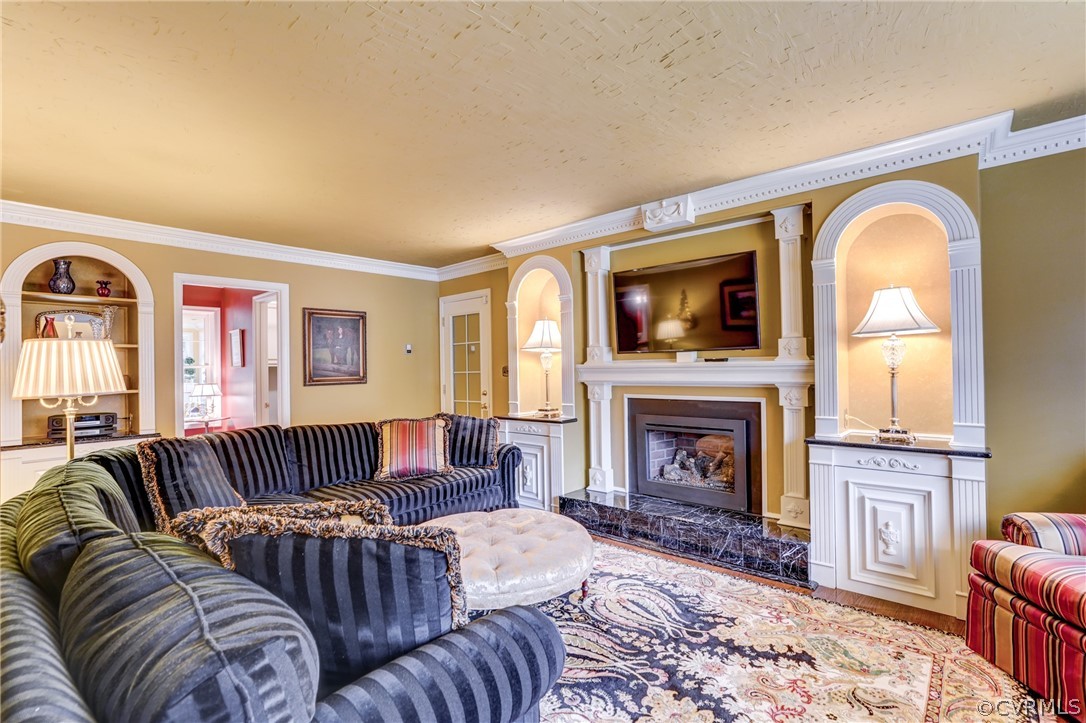 104 Tudor Road Colonial Heights, VA 23834 - Photo 22 of 50 a living room with a couch and a fireplace