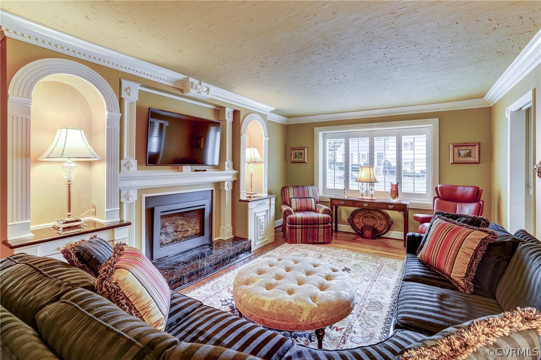 104 Tudor Road Colonial Heights, VA 23834 - Photo 25 of 50 a living room with furniture fireplace and a flat screen tv
